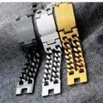 Drei Kreuz-Panzerarmbänder mit spanischem Gebetstext im Farbvergleich