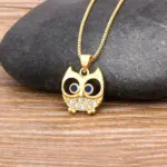Goldfarbene Eulenkette mit hellen Zirkonia und dunklen Augen