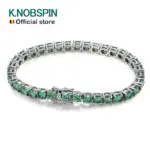 Grünes Moissanit Tennisarmband von KNOBSPIN mit silberfarbenen Fassungen