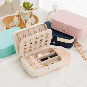 Reise-Schmuckbox mit Fächern für Ringe, Ohrringe und Ketten