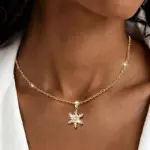 Goldfarbene Winterkette mit Schneeflocke und Zirkonia