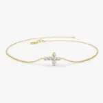 Goldfarbenes Moissanit Kreuzarmband aus 925 Silber laut Anbieter