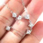 Elegante Damen Halskette mit Moissanit Anhänger und Quastenform