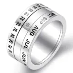 VQYSKO Design 7: silberfarbener Ring mit Zahlen, Monatskürzeln und kleinem hellem Zierelement