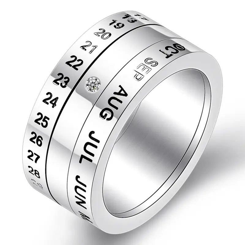 VQYSKO Design 7: silberfarbener Ring mit Zahlen, Monatskürzeln und kleinem hellem Zierelement