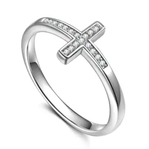 Huitan Kreuzring für Damen, silberfarbener Ring mit klarem Zirkonia-Kreuz auf weißem Hintergrund