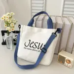 Jesus Schultertasche aus Polyester in heller Stoffoptik mit abnehmbarem blauem Schulterriemen