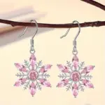 Huitan Weihnachtsohrringe mit Schneeflocken und rosa Zirkonia