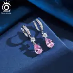ORSA JEWELS Paar silberfarbene Tropfen-Ohrhänger mit rosa und klaren Schmucksteinen, Studioaufnahme