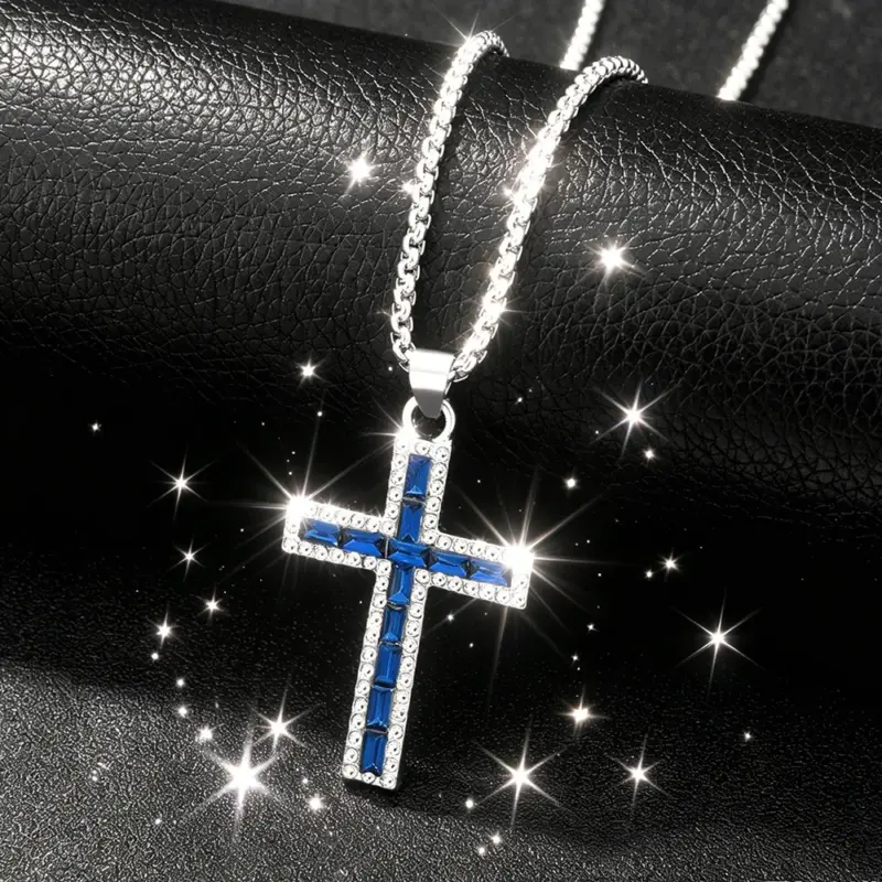 Silberfarbene Kreuzkette mit blauen Strasssteinen und Gliederkette