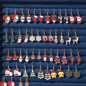 25 Paare goldfarbene Weihnachts-Ohrhänger mit Lebkuchenmann, Schneeflocke, Weihnachtsmann, Rentier und Tannenbaum auf blauem Samt