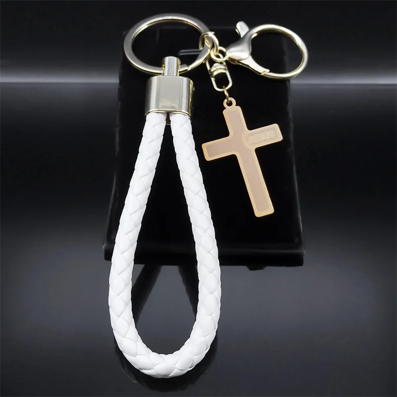AFAWA weißer Kreuz-Schlüsselanhänger mit goldfarbenem JESUS-Kreuz, Schlüsselring und Karabiner auf schwarzem Hintergrund