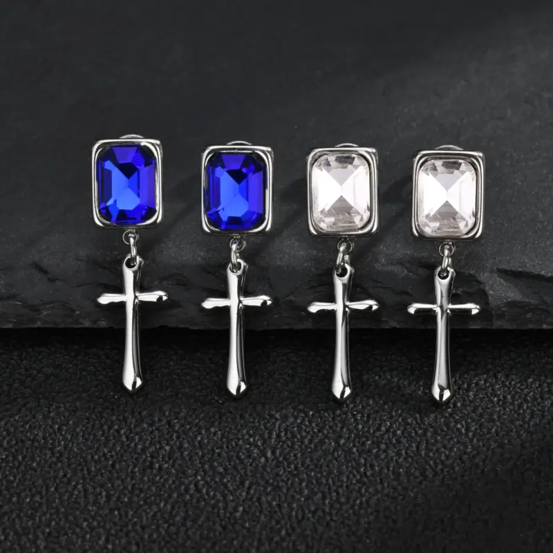kf-Sfbaff2a826f5483fba6b6d6a9a389073D VNOX Kreuz-Ohrhänger mit blauen und klaren Glassteinen auf dunklem Stein – Edelstahl in Silberoptik